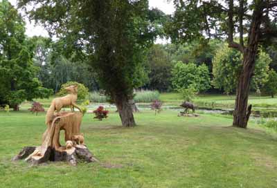 Carved fox and cubs plus boar